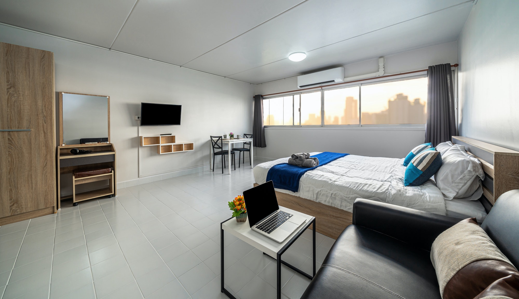 Luxury Interior living room with sofa bed and bed queen size, Dining table,air conditioner,